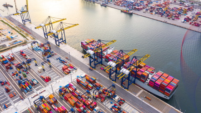 Container ship loading and unloading in sea port