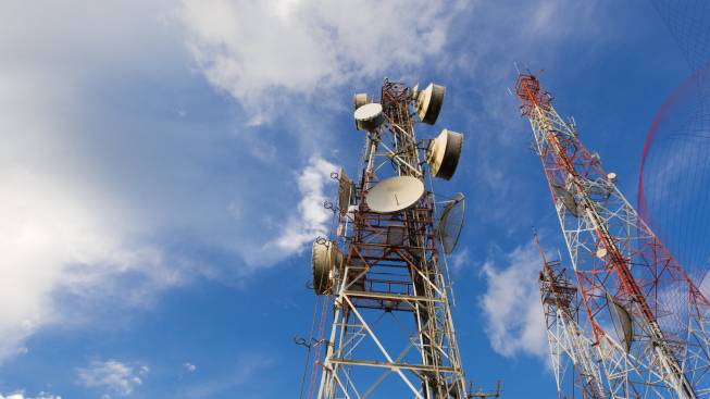 Telecommunication mast with antennas and wireless technology installations